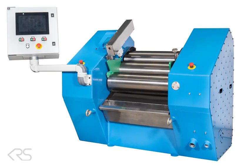 KRS three-roll mill with stainless steel rolls, take-off apron and swivel-mounted touchscreen control panel